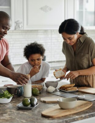 family making breakfast in the kitchen