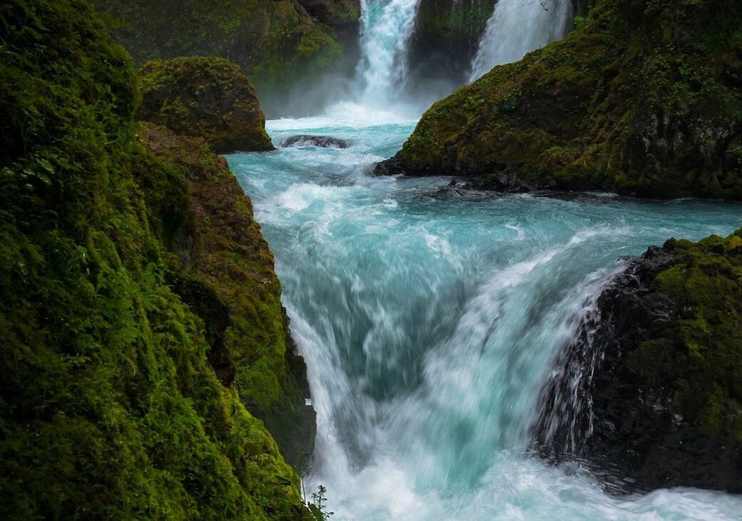 time lapse photography of flowing waterfall