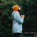 man wearing bonnet and hoodie