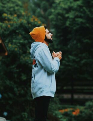 man wearing bonnet and hoodie