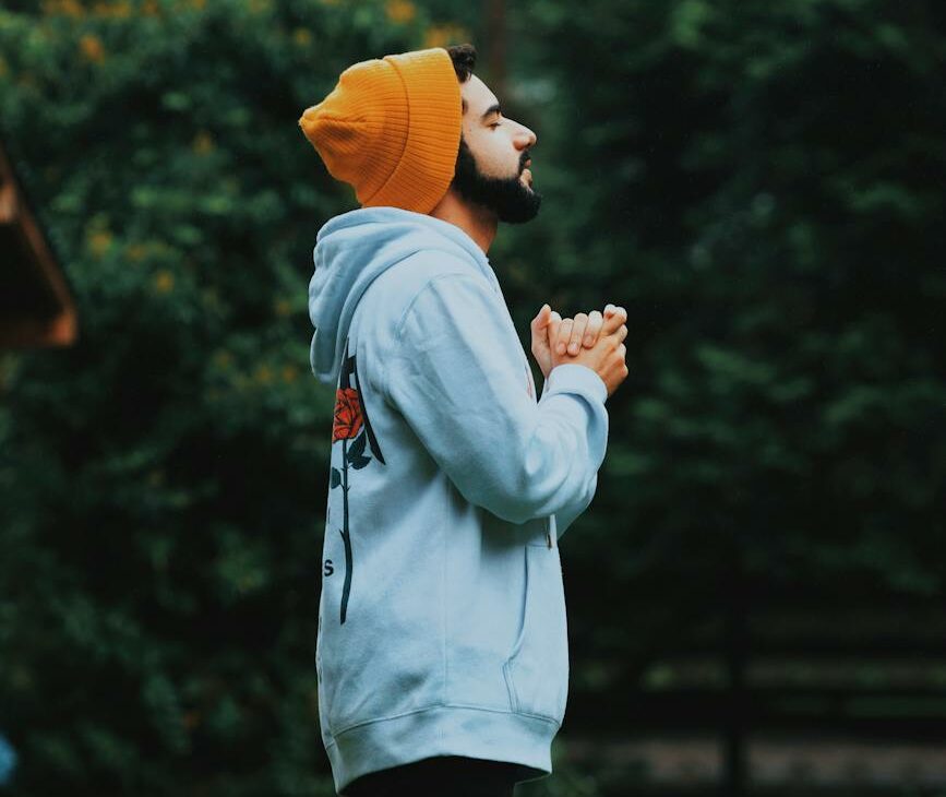 man wearing bonnet and hoodie