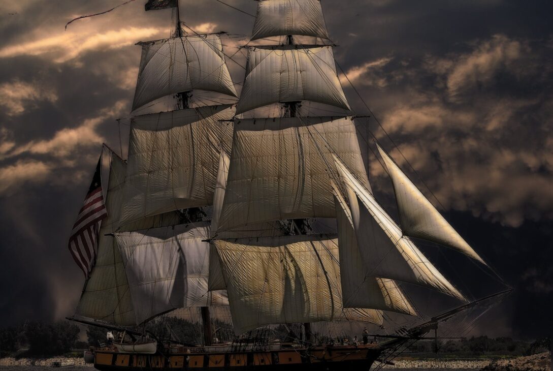 white and brown galleon ship