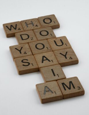 scrabble tiles on white surface