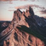 mountain range under beige sky