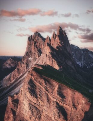 mountain range under beige sky